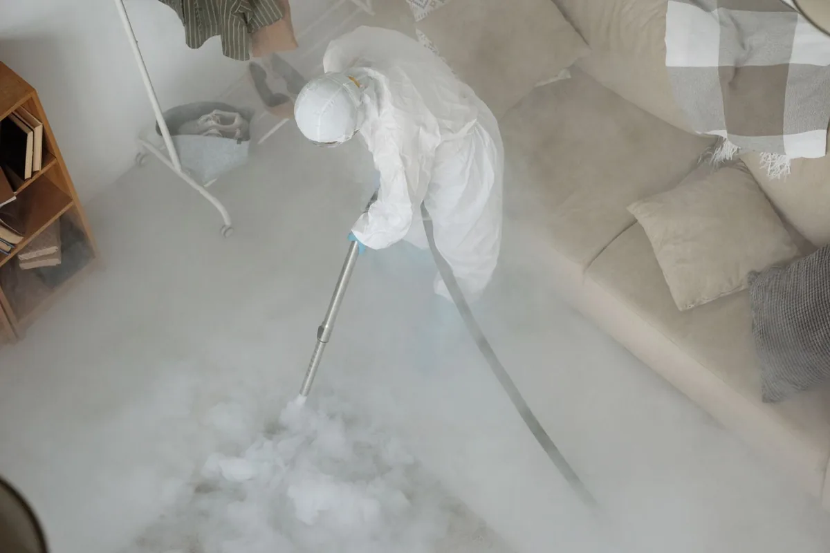 Biohazard cleanup technician in protective equipment, Broussard, LA